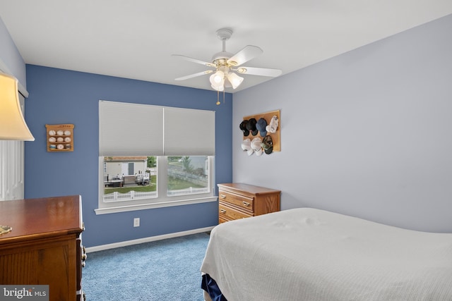 bedroom with carpet flooring, baseboards, and ceiling fan