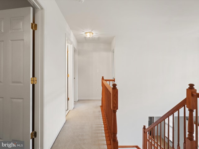 5204 Spanish Dollar Ct, Woodbridge, VA 22193 - corridor featuring an upstairs landing, light carpet, and baseboards