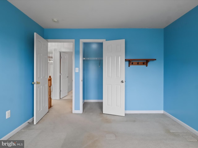 5204 Spanish Dollar Ct, Woodbridge, VA 22193 - unfurnished bedroom featuring carpet flooring, baseboards, and a closet