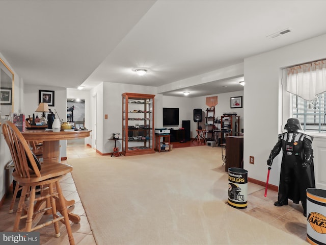 5204 Spanish Dollar Ct, Woodbridge, VA 22193 - living room featuring light tile patterned floors and baseboards