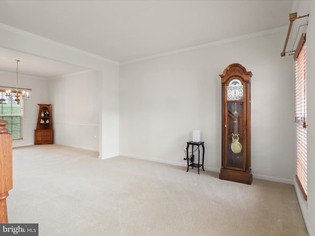 5204 Spanish Dollar Ct, Woodbridge, VA 22193 - spare room featuring carpet, crown molding, a chandelier, and baseboards