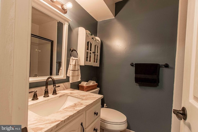 14365 Salsbury Ct, Woodbridge, VA 22193 - bathroom with toilet, vanity, and a shower
