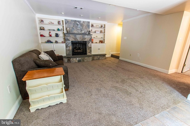 14365 Salsbury Ct, Woodbridge, VA 22193 - carpeted living area featuring a stone fireplace, crown molding, baseboards, and built in shelves