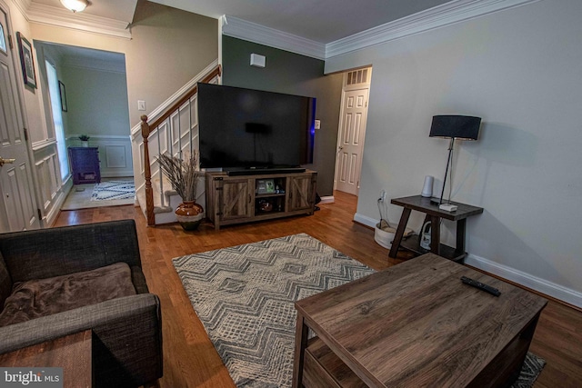 14365 Salsbury Ct, Woodbridge, VA 22193 - living area featuring stairway, crown molding, wood finished floors, and baseboards