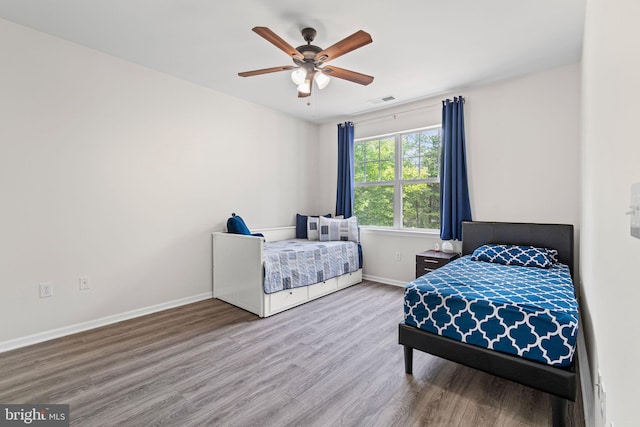 12958 Centre Park Cir Unit 219, Herndon, VA 20171 - bedroom featuring wood finished floors and ceiling fan