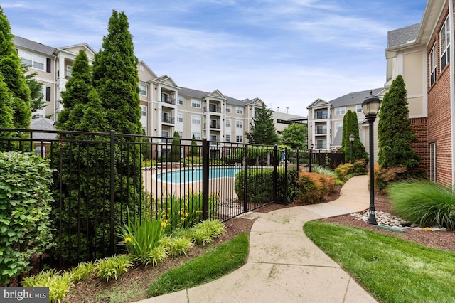 12958 Centre Park Cir Unit 219, Herndon, VA 20171 - community pool featuring a residential view