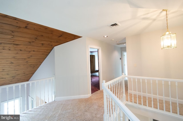 5470 Moose Lodge Rd, Cambridge, MD 21613 - hallway with an upstairs landing, carpet, wood ceiling, vaulted ceiling, and recessed lighting