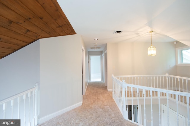 5470 Moose Lodge Rd, Cambridge, MD 21613 - hallway featuring light carpet and an upstairs landing