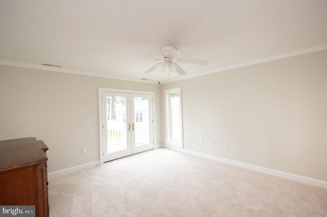 5470 Moose Lodge Rd, Cambridge, MD 21613 - spare room with ceiling fan, carpet, french doors, and crown molding