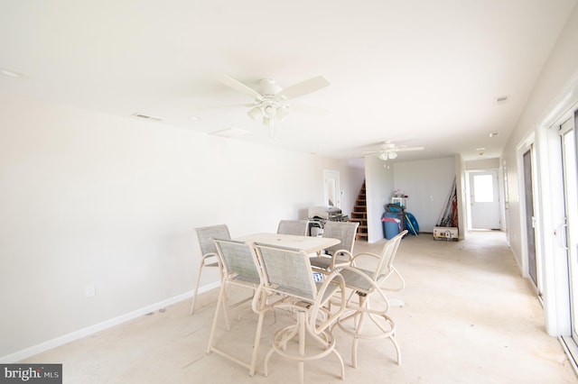 5470 Moose Lodge Rd, Cambridge, MD 21613 - dining space featuring a ceiling fan and stairs