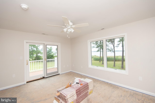 5470 Moose Lodge Rd, Cambridge, MD 21613 - spare room with healthy amount of natural light, wood finished floors, a ceiling fan, and a smoke detector