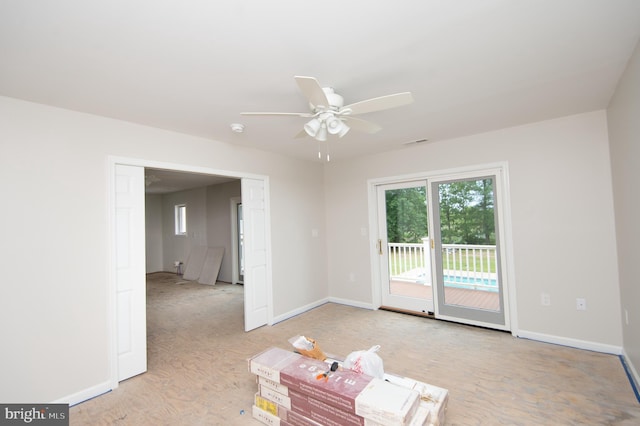 5470 Moose Lodge Rd, Cambridge, MD 21613 - empty room with healthy amount of natural light, a ceiling fan, and a smoke detector