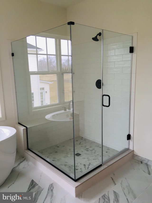 0006 Copperleaf Blvd, Hanover, MD 21076 - full bath featuring a shower stall, marble look tiles, and a freestanding tub