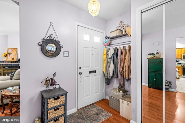 2054 Harbour Dr, Palmyra, NJ 08065 - entrance foyer featuring wood finished floors and a chandelier