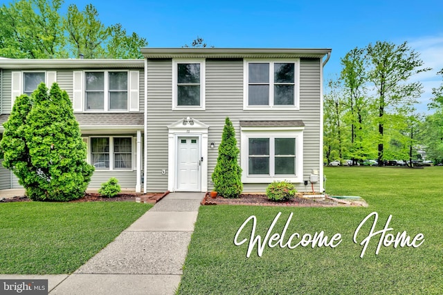 73 Doe Ct, Monmouth Junction, NJ 08852 - view of front of home with a front lawn