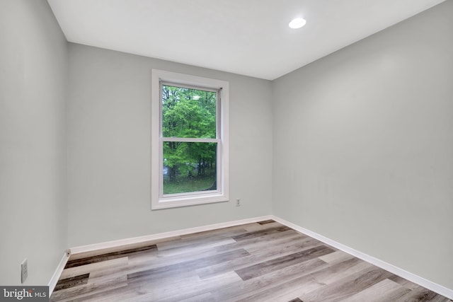 73 Doe Ct, Monmouth Junction, NJ 08852 - spare room with wood finished floors, baseboards, and recessed lighting