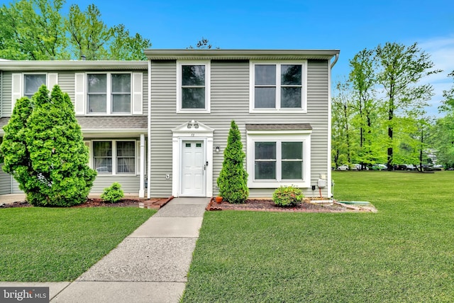 73 Doe Ct, Monmouth Junction, NJ 08852 - view of front of house featuring a front yard