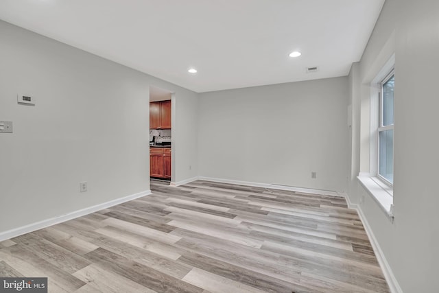 73 Doe Ct, Monmouth Junction, NJ 08852 - empty room featuring light wood-style flooring, recessed lighting, and baseboards