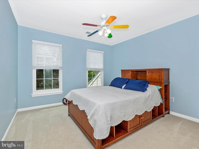 6470 Saddlebrook Ln, Frederick, MD 21701 - bedroom with baseboards, light carpet, and ceiling fan