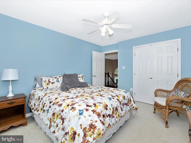 6470 Saddlebrook Ln, Frederick, MD 21701 - bedroom with carpet floors, a closet, and a ceiling fan