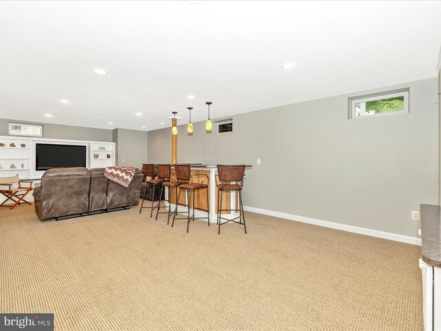 6470 Saddlebrook Ln, Frederick, MD 21701 - dining area featuring light colored carpet, bar, recessed lighting, and baseboards