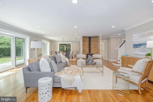 8602 Woodbrook Ln, Chevy Chase, MD 20815 - living area featuring stairs, ornamental molding, light wood-type flooring, and recessed lighting