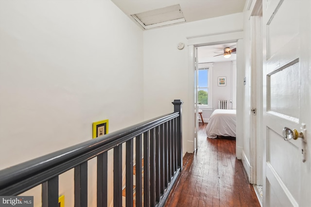 1132 Roland Heights Ave, Baltimore, MD 21211 - corridor with hardwood / wood-style flooring, attic access, and an upstairs landing