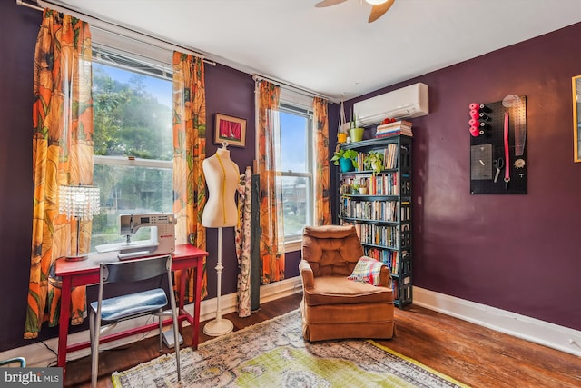 1132 Roland Heights Ave, Baltimore, MD 21211 - sitting room featuring a wall mounted air conditioner, wood finished floors, baseboards, and ceiling fan