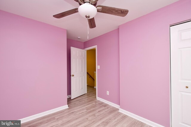 10305 Butternut Cir, Manassas, VA 20110 - unfurnished bedroom featuring light wood-style floors, baseboards, and a ceiling fan