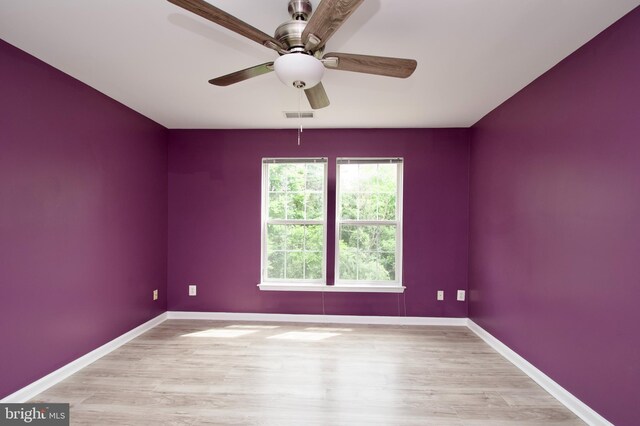 10305 Butternut Cir, Manassas, VA 20110 - empty room featuring wood finished floors, baseboards, and a ceiling fan