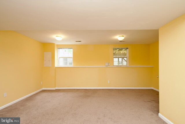 10305 Butternut Cir, Manassas, VA 20110 - spare room featuring carpet flooring, baseboards, and electric panel