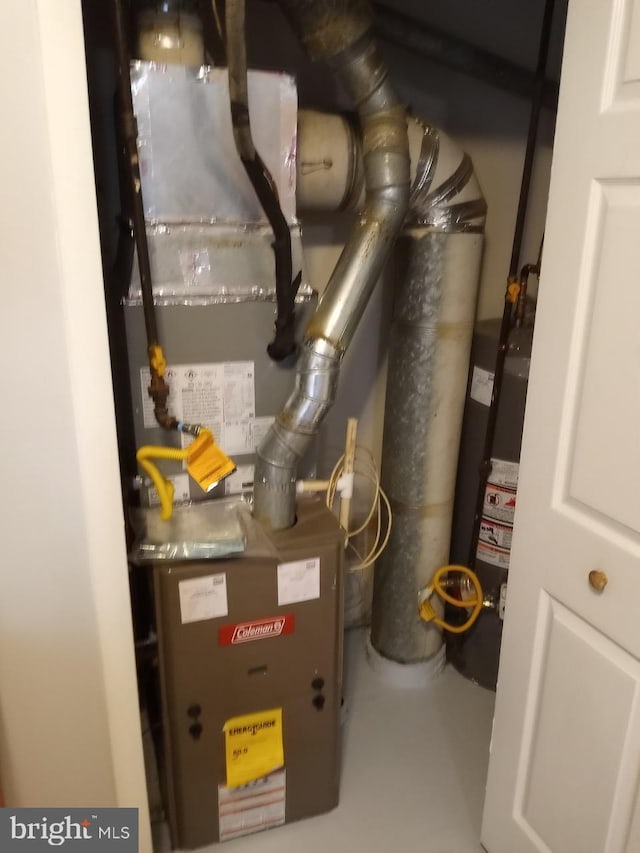 28 Ridgewood Pl, Willingboro, NJ 08046 - utility room featuring gas water heater and heating unit