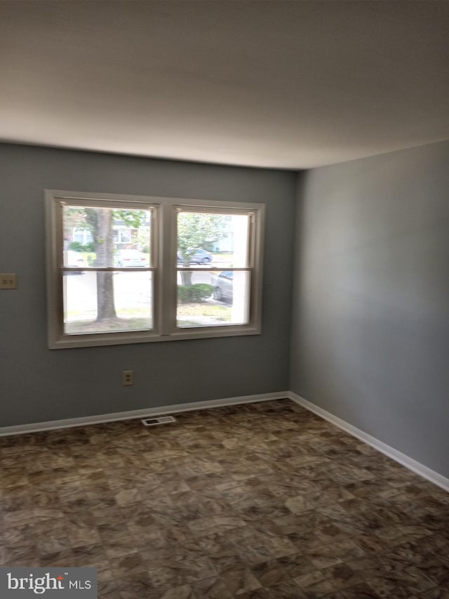 28 Ridgewood Pl, Willingboro, NJ 08046 - empty room featuring baseboards and dark floors