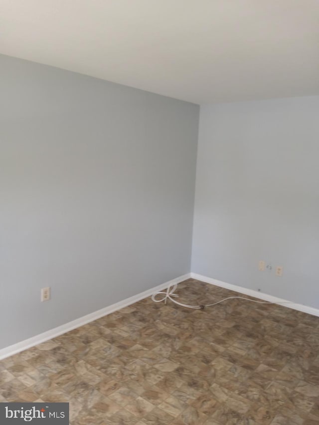 28 Ridgewood Pl, Willingboro, NJ 08046 - spare room with tile patterned floors and baseboards
