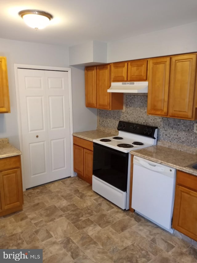 28 Ridgewood Pl, Willingboro, NJ 08046 - kitchen featuring white appliances, under cabinet range hood, backsplash, and brown cabinets