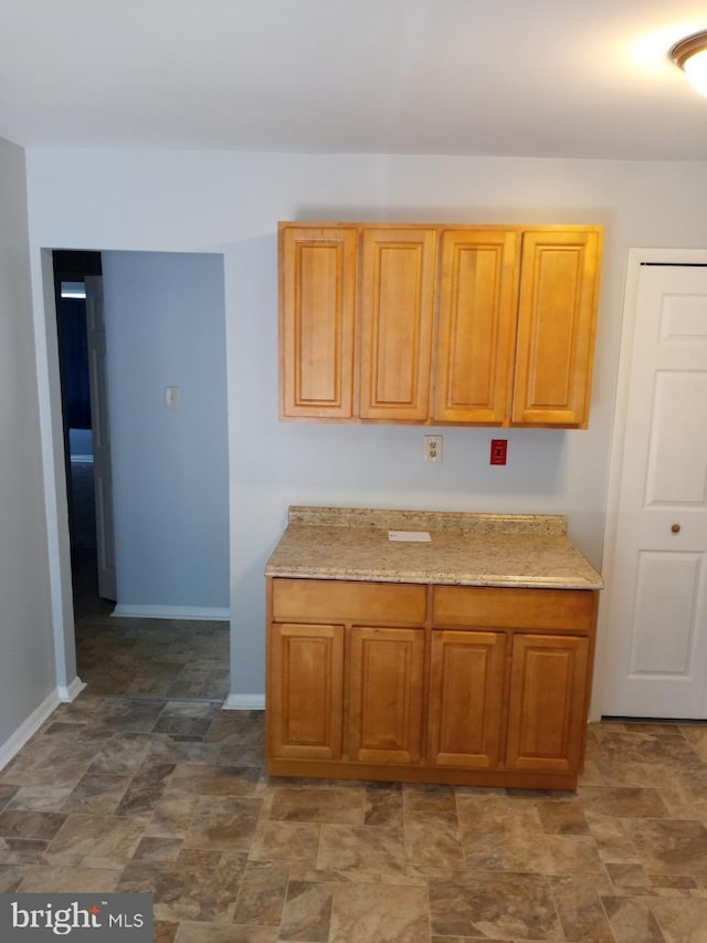 28 Ridgewood Pl, Willingboro, NJ 08046 - kitchen featuring stone finish flooring and baseboards