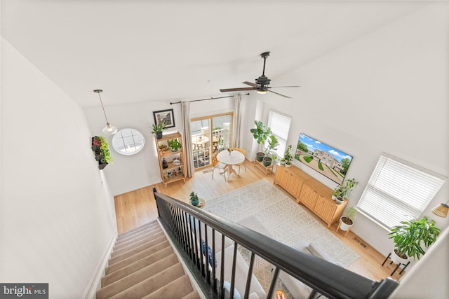 20387 Birchmere Ter, Ashburn, VA 20147 - staircase featuring wood finished floors, baseboards, and ceiling fan