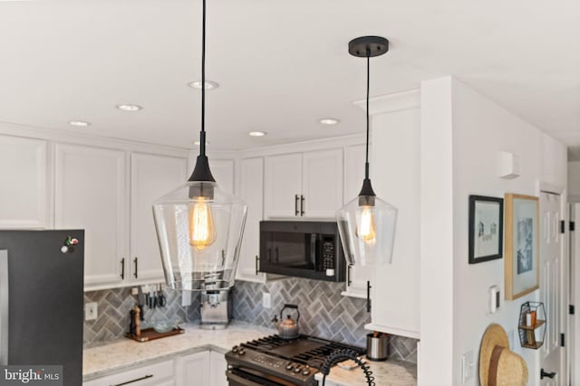 20387 Birchmere Ter, Ashburn, VA 20147 - kitchen featuring stainless steel appliances, white cabinets, backsplash, pendant lighting, and recessed lighting
