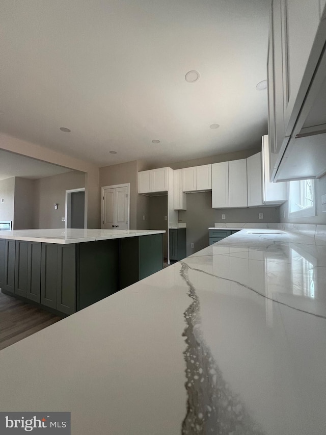 607 Slonaker Ln, Martinsburg, WV 25405 - kitchen featuring white cabinetry, wood finished floors, and recessed lighting