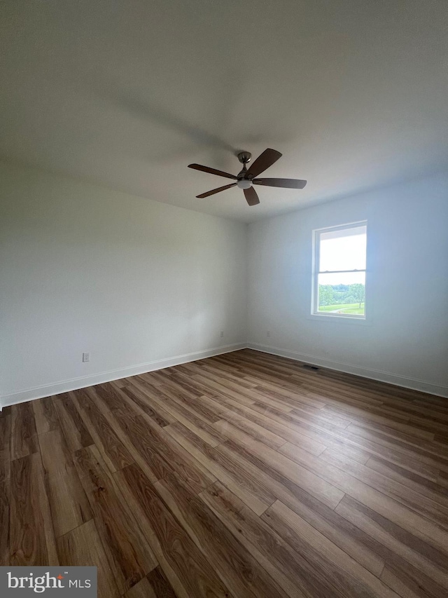 607 Slonaker Ln, Martinsburg, WV 25405 - unfurnished room with dark wood finished floors and ceiling fan