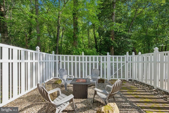 view of patio / terrace featuring a fire pit