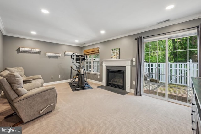 living room with recessed lighting, crown molding, carpet flooring, baseboards, and a fireplace with flush hearth