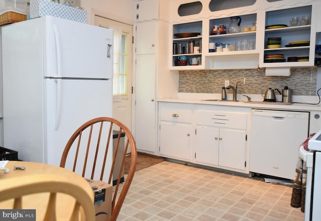 715 Susquehanna Cir, Newark, DE 19711 - kitchen with white appliances, a sink, light countertops, white cabinetry, and backsplash