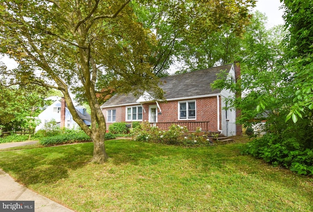715 Susquehanna Cir, Newark, DE 19711 - view of front facade with brick siding and a front yard