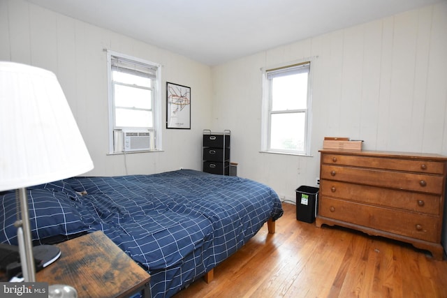 715 Susquehanna Cir, Newark, DE 19711 - bedroom featuring wood finished floors, multiple windows, and cooling unit