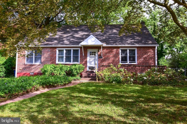715 Susquehanna Cir, Newark, DE 19711 - view of front of house featuring brick siding, a front yard, and roof with shingles