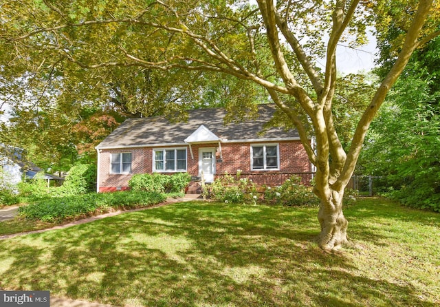 715 Susquehanna Cir, Newark, DE 19711 - cape cod-style house with brick siding and a front lawn