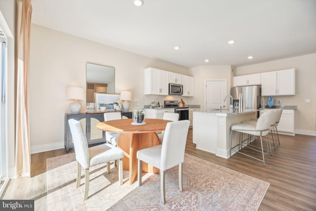 116 Munsee Cir, Winchester, VA 22602 - dining space featuring wood finished floors, recessed lighting, and baseboards