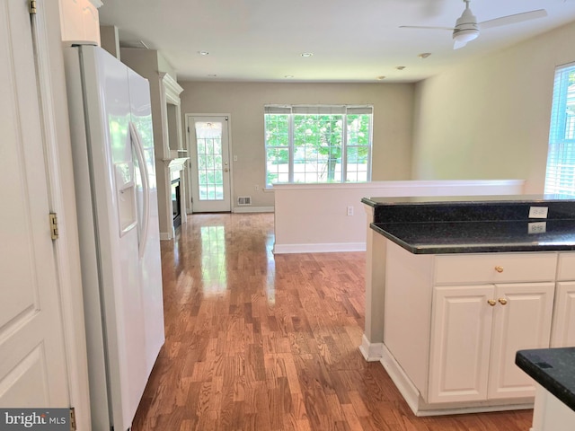 10 Honeyflower, Bordentown, NJ 08620 - kitchen with white fridge with ice dispenser, a ceiling fan, light wood-style flooring, white cabinetry, and recessed lighting