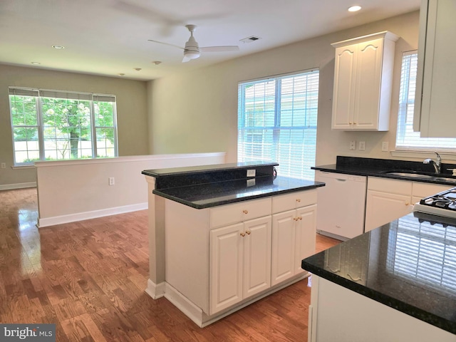 10 Honeyflower, Bordentown, NJ 08620 - kitchen featuring white dishwasher, a sink, light wood finished floors, a ceiling fan, and a center island